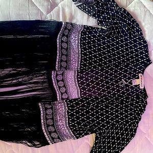 So this is a H&M Coachella shirt it’s and XS supper pretty